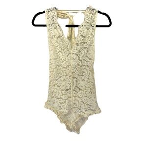 Zinke intimates and sleep wear. Lace halter romper. Women’s size small.